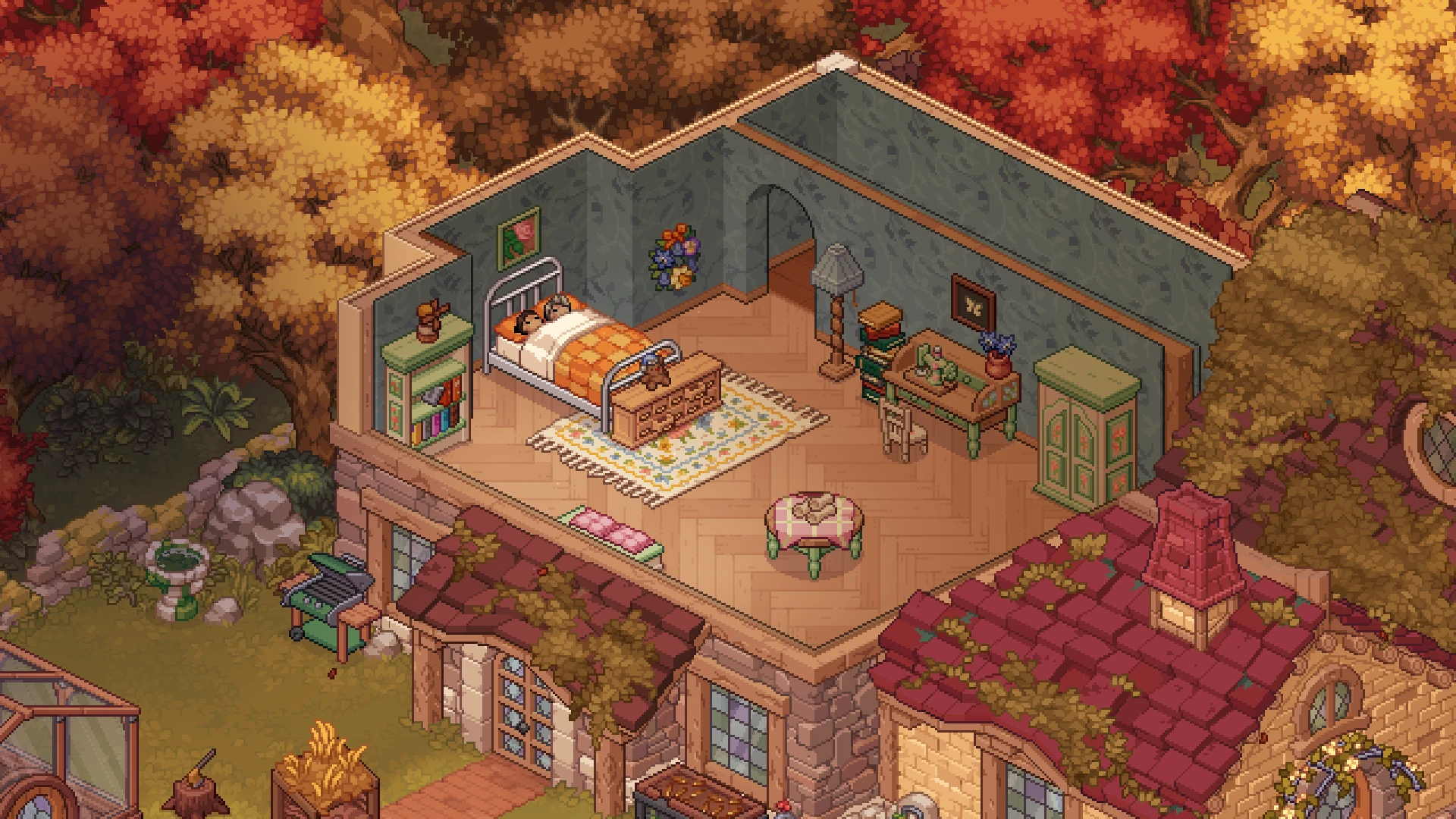A cosy upstairs bedroom in a cottage among autumn trees: an iron bed made up with an orange patchwork quilt, a desk, shelves and flowers
